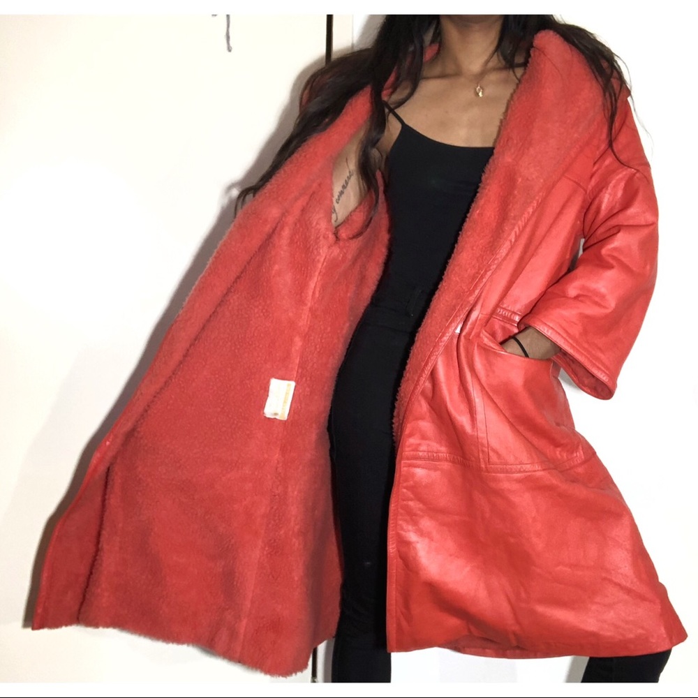 Orange leather/fur combo winter trench